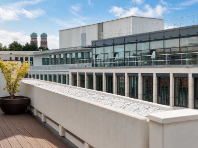 Großzügige Dachgeschosswohnung mit Blick auf Frauenkirche und Olympiaturm in der Maxvorstadt