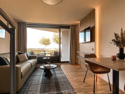 Wohnen, wo andere Urlaub machen! | Moderne Eigentums- / Ferienwohnung