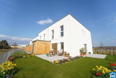 Familienglück im Grünen – nachhaltige Reihenhäuser am Kanal