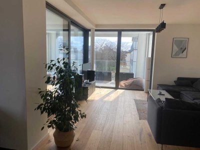 Helle 2-Zimmer-Wohnung mit Balkon und Blick auf die Elbe im Neubau – Werder Magdeburg