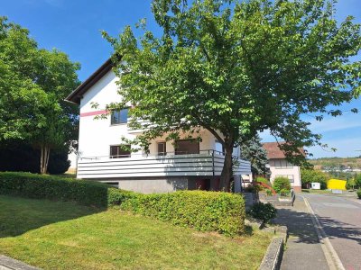 Zweifamilien- oder Mehrgenerationenhaus mit ELW. + 5 Garagen in guter Wohnlage
