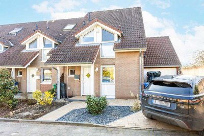 Traumhaftes Familienheim: Reihenendhaus mit Garage in idyllischer Vorstadtlage"