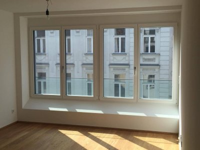 Helle 2-Zimmer-Neubauwohnung mit Altbauflair im Siebten