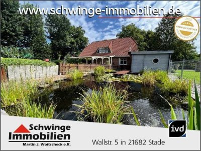 SCHWINGE IMMOBILIEN Stade: Familienhaus mit Sauna und sehr schöner Gartenanlage!