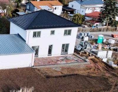 Einfamilienhaus mit großzügigem Grundstück in idylischer Lage als Erstbezug