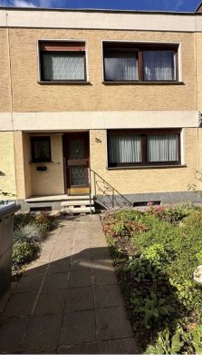 Reihenmittelhaus mit schönem Garten, Garage und Stellplatz, 10min Gehweg zur Porta