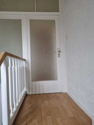Charmante 4-5 Zimmer Dachgeschosswohnung in Arheilgen mit Balkon und Garage
