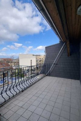 Charmante 2-Zimmer-Dachgeschosswohnung mit großer Terrasse