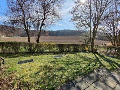 Blick in die Natur gesucht, tolle 3-Zimmer-EG Wohnung mit Terrasse und Tiefgaragenstellplatz,