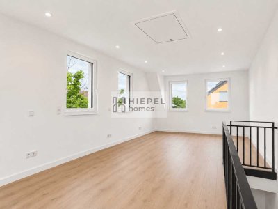Modernes Neubau-Reihenendhaus mit Stellplatz und großer Dachterrasse