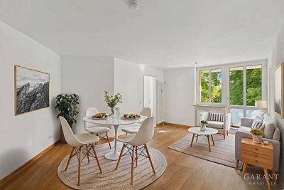 Sofort bezugsbereit: Charmante Wohnung mit Balkon und Blick ins Grüne, inkl. Tiefgaragenstellplatz