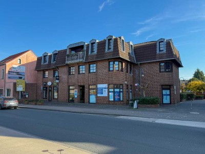 Attraktives Mehrfamilien- & Geschäftshaus in zentraler Lage von Meerbusch-Lank