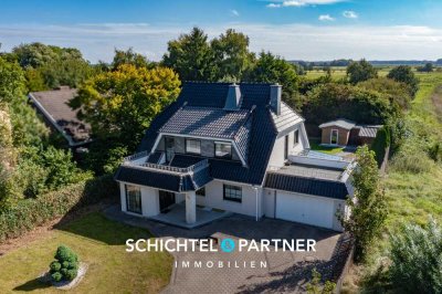 Imsum | Schickes Einfamilienhaus mit großem Garten, Terrasse und Garage