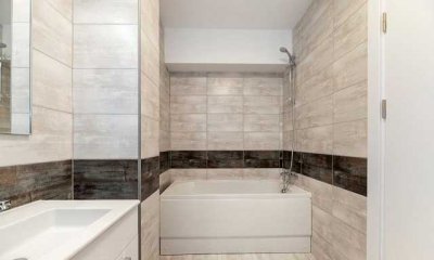 1,5-Zimmer-Wohnung mit möblierter Küche und sonnigem Balkon und herrlicher Aussicht!