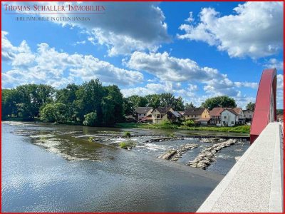 Direkt am Fluss. Mitten in der Stadt.