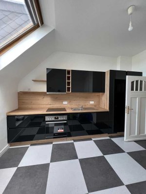 Exklusive, sanierte 2-Zimmer-Altbau-Wohnung mit Wohnküche in Oberkassel Düsseldorf