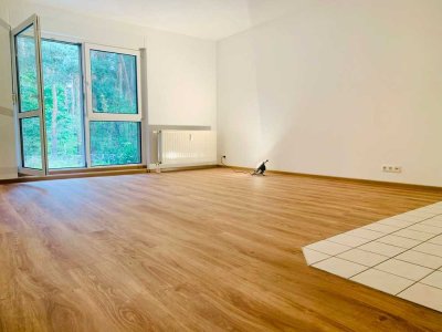 Hochwertig sanierte Erdgeschosswohnung mit großer Terrasse und Waldblick