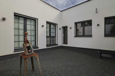 Leben und Arbeiten im Loftstil – Energieeffizient, hochwertig saniert und mit schönem Garten
