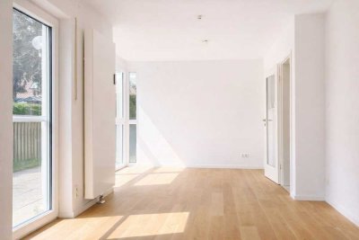 Modern und Komfort: Helle 2-Zimmer-Maisonette-Wohnung mit Garten in Trudering