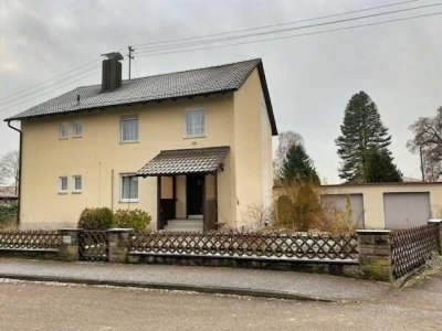 Charmantes Zweifamilenhaus auf großem Grundstück
