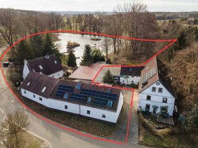 Drei exklusive Einfamilienhäuser mit Privatsee, Insel & modernster Technik