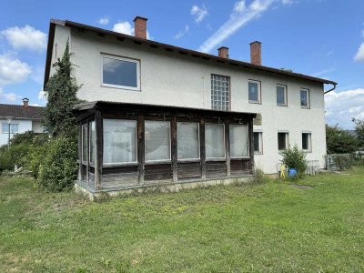 Grundstück mit sanierungsbedürftigen Einfamilienhaus