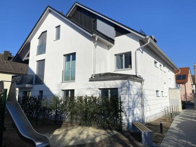 Moderne 3-Zimmer-Dachgeschosswohnung mit Balkon & Tiefgarage in ruhiger Lage von Neu-Esting