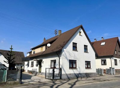 Großzügiges Einfamilienhaus mit Garage, Ökonomiegebäude und zusätzlicher Bauoption in Plittersdorf!