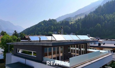 Wohnen mit Atmosphäre, Stil und Licht – Penthousewohnung mit Kachelofen und Ausblick!