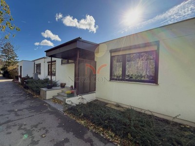 Verkauf mit Wohnrecht - Südstadtbungalow mit Pool, Sauna und Wintergarten!