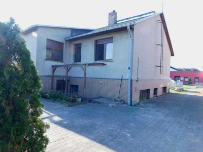 Einfamilienhaus mit schönem Garten in Paulinenaue