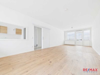 Modernisierte 4-Zimmer-Wohnung mit 2 Balkonen, TG-Stellplatz uvm.