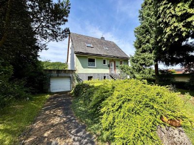 Einfamilienhaus mit zusätzlichem Baugrundstück in zentraler Lage von Burbach