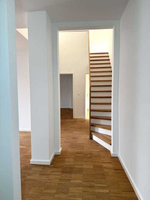 Ein Rückzugsort über den Dächern der Stadt - modernes Penthouse mit Wohlfühlambiente