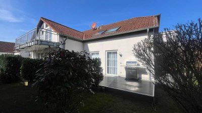 Gepflegte Erdgeschoss-Maisonette mit Terrasse, Garten und Balkon sowie Garagenplatz