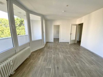 Familienglück auf zwei Ebenen: 4-Zimmer-Wohnung mit Balkon und Gäste-WC frei!