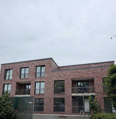 Neubau: Exklusive 2-Zi.-Whg. (ca. 52,5 m²) mit Terrasse + TG-Stellplatz in zentraler Wohnlage