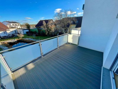 ERSTBEZUG! Geräumige Eigentumswohnung im Obergeschoss mit Balkon und Dachterrasse