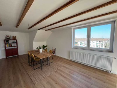 Erstbezug! DG-Wohnung mit Stellplatz und eigenem Garten