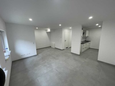 Neubau – Erstbezug! Attraktive 3-Zimmer-Souterrain-Wohnung mit EBK und Möbel in Rastatt/Wintersdorf