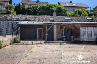 BERK Immobilien – Wohnen mit Potenzial: Unkonventionelle Immobilie in Hausen