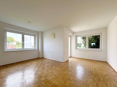 TOP ERDGESCHOSSWOHNUNG MIT TOLLER TERRASSE UND GARTENZUGANG