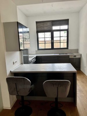 Modernisierte 2-Raum-Wohnung mit Einbauküche in Mannheim