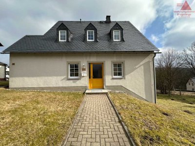 Ländliches Anwesen in Marienberg: Kombination aus Wohn- und Geschäftshaus im Dreiseitenhof