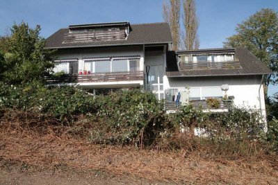 3-Zimmer-Wohnung mit großer Terrasse, eigenem Garten und Pkw-Stellplatz