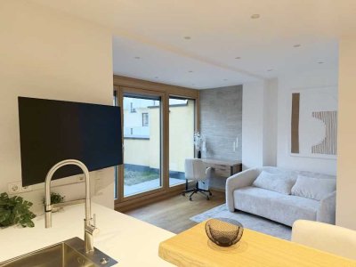 Exklusive 2-Zimmer-Wohnung mit Terrasse in Toplage direkt am Englischen Garten