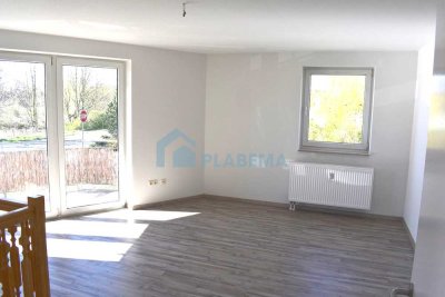 4-Zimmer-Wohnung mit Balkon, Einbauküche, wohnlichen Räumen im Souterrain & Stellplatzoption