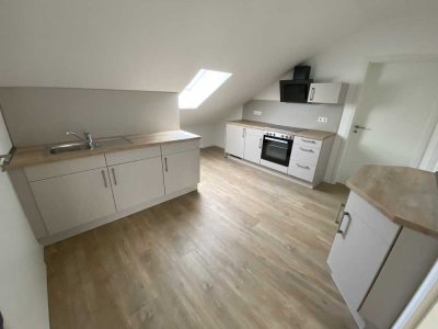 2-Zimmer-DG-Apartment mit EBK in Hille, Rothenuffeln