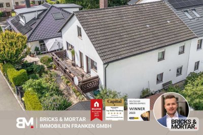 Familienidylle in der Gartenstadt – Einfamilienhaus mit großzügigem Balkon und Garten zum Wohlfühlen