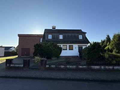 Einfamilienhaus mit Werkstatt, Garage und Einliegerwohnung in Ganderkesee